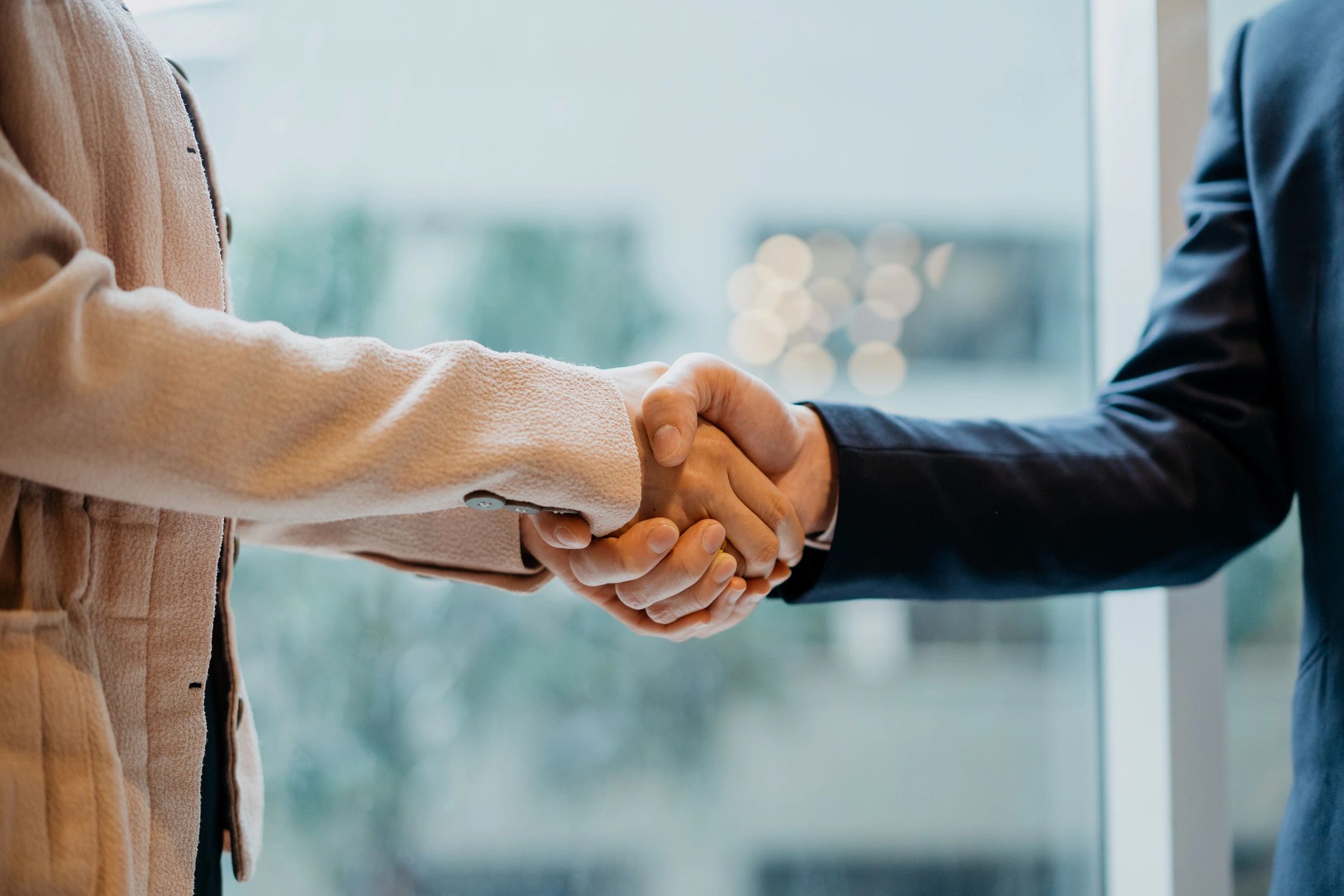 Business handshake after closing a deal